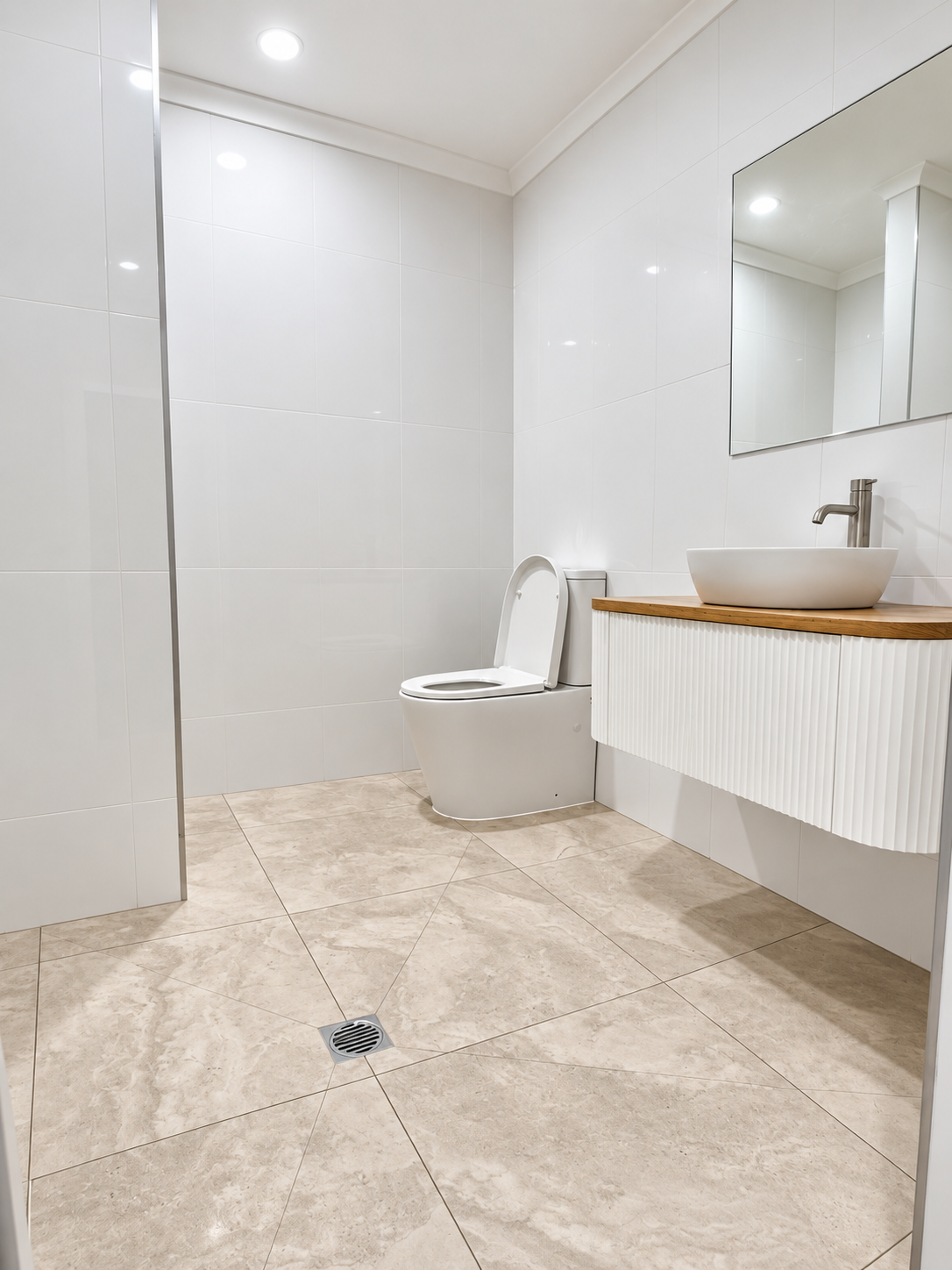 Placeholder: tiler laying a large-format porcelain tile with a notched trowel